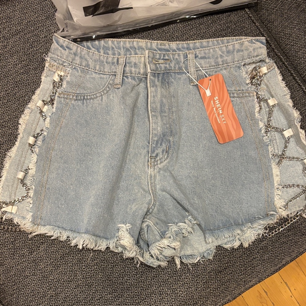 BRAND NEW!!SHEIN Light Blue Jean Shorts with Chained out sides to show your hips